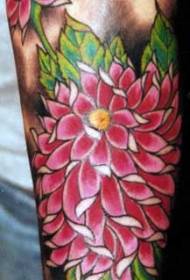 Fin rosa blomster tatovering på armen