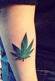 Arm maple leaf tattoo