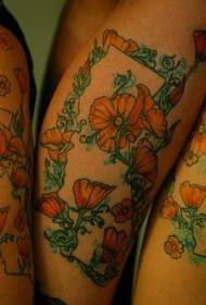 Poppy and vine colorful arm tattoo pattern