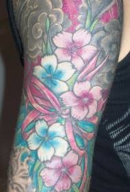 Teenage girl arms colorful flowers tattoo pattern