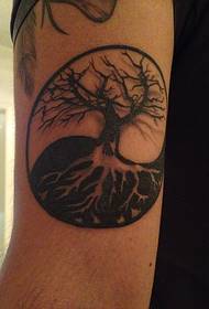 Arm black and white tree tattoo pattern