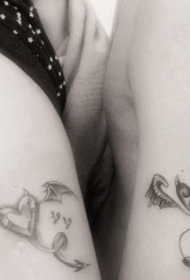 Tatouage coeur et ailes d'ange démon