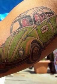 Volkswagen green taxi tattoo pattern on the arm
