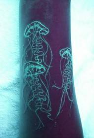Arm white glowing jellyfish tattoo pattern