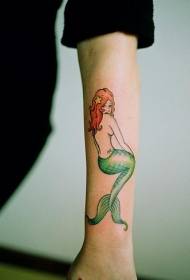 Red-haired mermaid tattoo pattern on arm