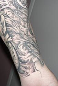 Arm black and gray personality tattoo pattern