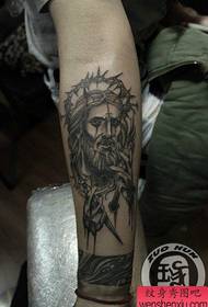 Arm klassieke pop-jesus-tatoeëringspatroon