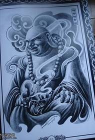 Un mudellu dominante di tatuaggi di Buddha maestru