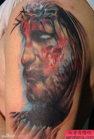 Et klassisk portrett av Jesus som lider av tatoveringer
