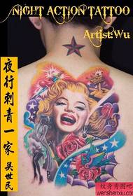 a colorful Monroe portrait tattoo on the back