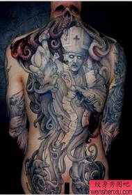 a horrible full-back zombie tattoo