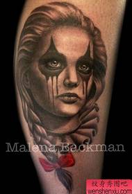 a beautiful beauty clown tattoo work