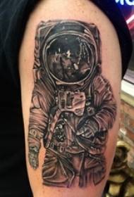 Boy's arm on black gray point thorn simple abstract line character astronaut tattoo picture