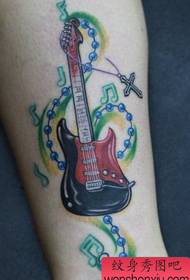 Female Tattoo Pattern: Leg Color Bass Chain Chain Musical Tattoo Pattern Tattoo Picture