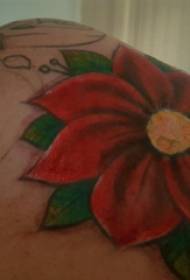 Achterschouder tattoo, mannelijke schouder, gekleurde bloemen, tattoo foto