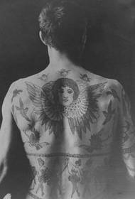 Man's back domineering tattoo pattern