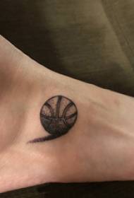 Instep tattoo, black basketball tattoo picture on the instep of a boy