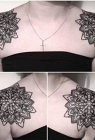 Female shoulders on black geometric tattoo mandala pattern tattoo