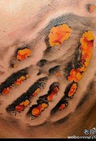 An alternative cool torn handprint tattoo on the chest