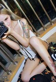 Camera woman tattoo pattern