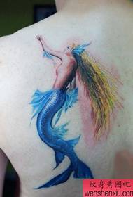 Beautiful and beautiful mermaid tattoo on the back