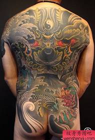 Male back with cool back lion tattoo pattern