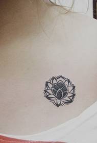 Female shoulder small black white lotus totem tattoo