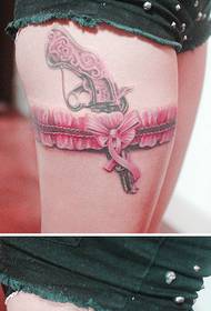 Beautiful pink lace and pistol tattoo pattern