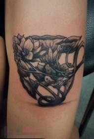 Girl's arm on black gray point thorn technique plant material lotus and cup tattoo picture