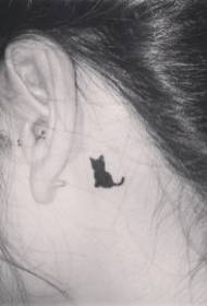 Small and cute cat tattoo behind the ear