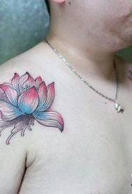 Beautiful lotus tattoo pattern on male shoulder