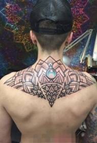 Boy's neck behind black line creative pattern tattoo pattern