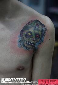 Alternative cool zombie tattoo pattern on male shoulder