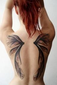 Girl back with a pair of cute wings tattoos