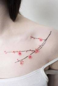 Babae sa ilalim ng collarbone na pininturahan na watercolor art na magagandang cherry blossom tattoo na larawan