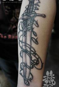 Male arm classic sword and vitex tattoo pattern