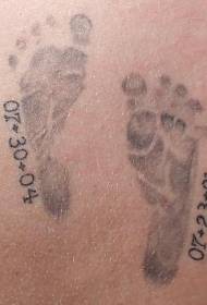 Shoulder brown kid footprints tattoo pattern