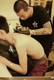 Tattoo artist on-site personality tattoo