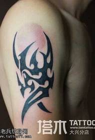 Men's arm totem tattoo pattern