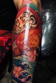 Alternative men's arm colorful tumbler tattoo