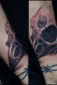 Adler Tattoo Muster op d'Knöchel