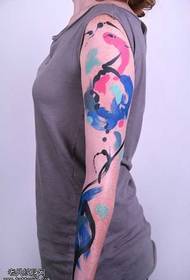 braço padrão de tatuagem de lula de tinta colorida