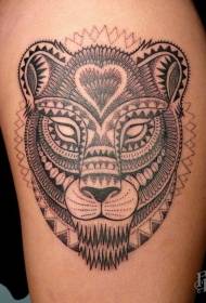 Motif de tatouage de tête de lion tribal