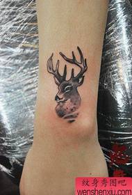 Girls wrists small and cute deer tattoo pattern