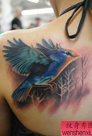 girl's shoulder color bird tattoo pattern