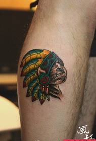 a classic tribal cat tattoo pattern on the leg