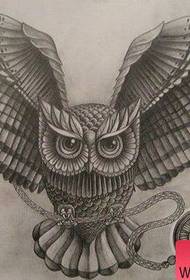 a very handsome black and white owl tattoo Manuscript