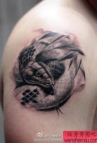Wzór tatuażu węża: Obraz tatuażu ramienia węża
