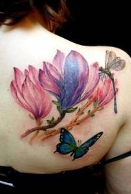 Fantastico tatuaggio a forma di farfalla e fiore di libellula sul retro