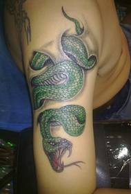 personality domineering green snake arm tattoo